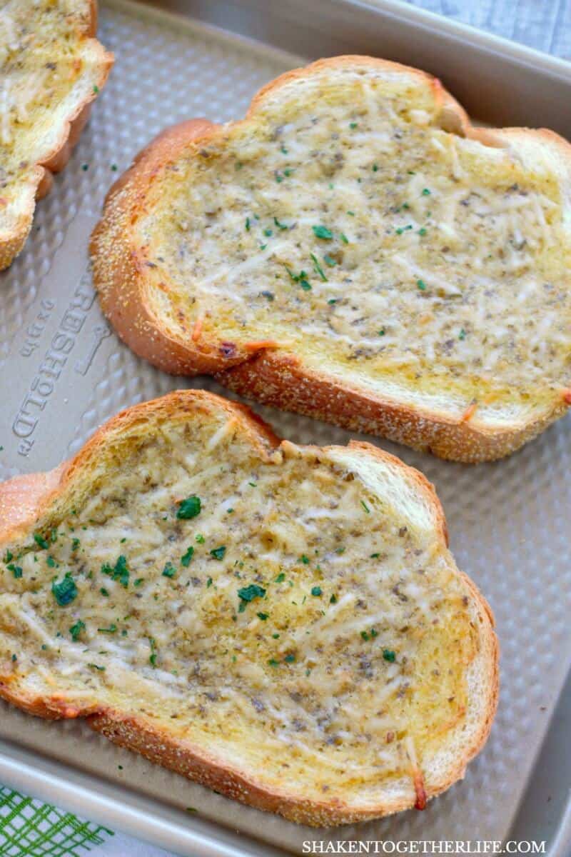 slices of bread with pesto and butter after baking