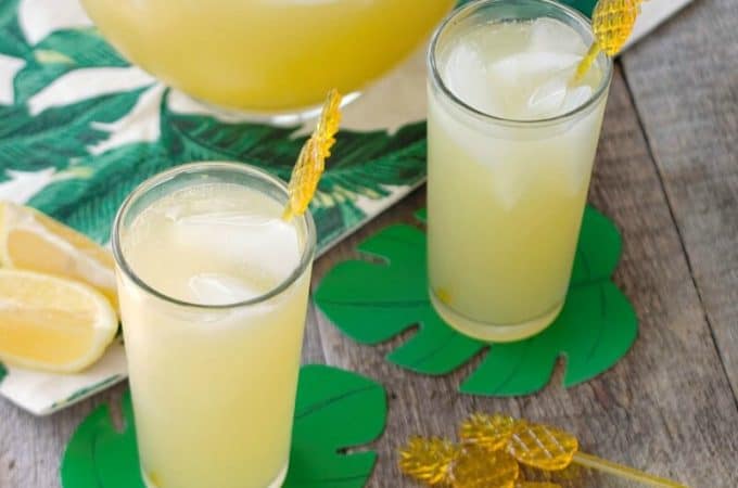 Skinny Sparkling Pineapple Lemonade Punch has 3 ingredients and just 50 calories per glass! This easy to make sparkling pineapple lemonade is perfect to make for parties and sip by the pool all Summer long!