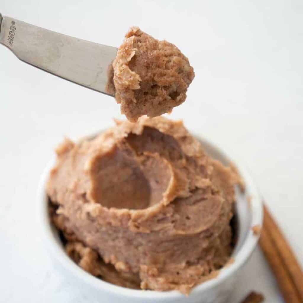 knife with cinnamon butter on it