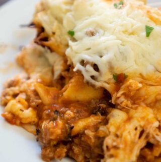 lazy lasagna made with ravioli on white plate