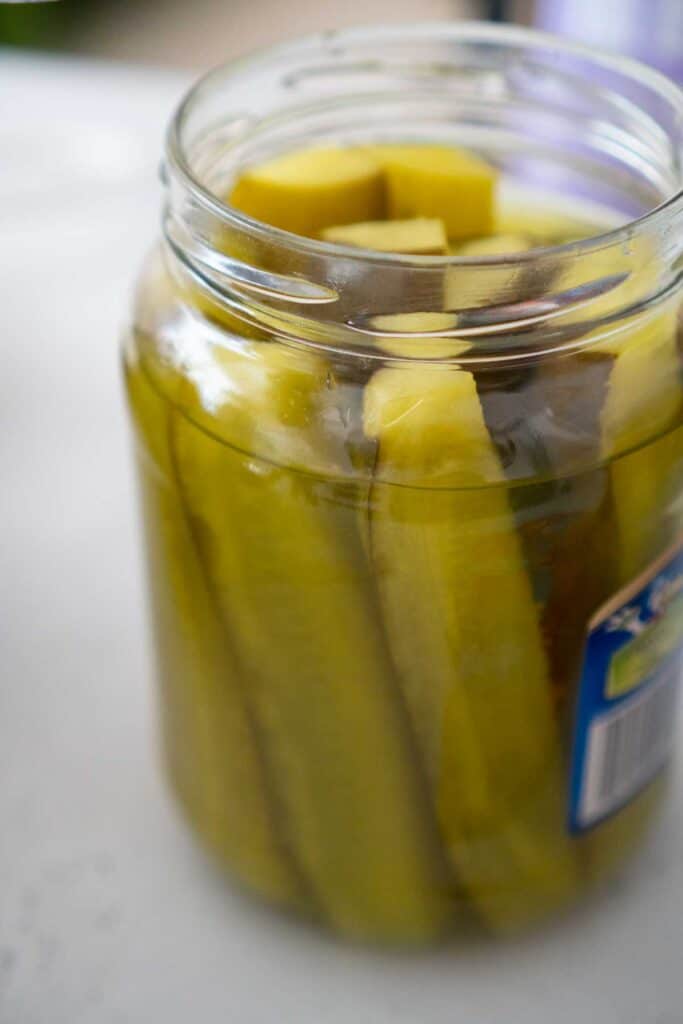 pickle jar with an inch of brine poured out to make koolickles