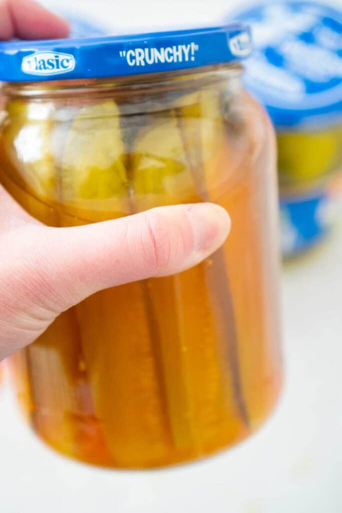 shaking jar of kool aid pickles