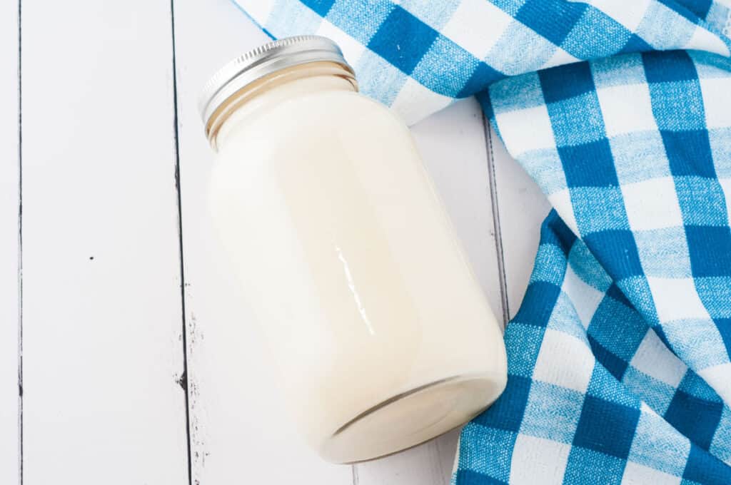 mixing pancake batter in a jar
