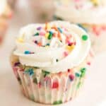 close up of funfetti cupcake with sprinkles