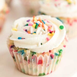 close up of funfetti cupcake with sprinkles