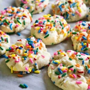 funfetti cookies on parchment paper