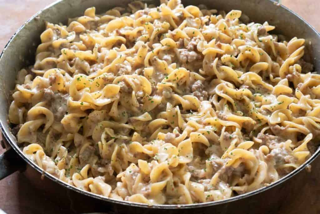 creamy sausage pasta in pan