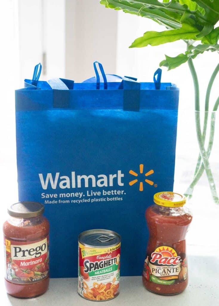 reusable walmart shopping bag with sapghetti-os can, pace salsa, and prego marinara