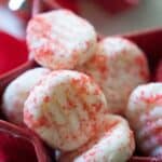 cream cheese mints with red sprinkles in red star-shaped candy dish