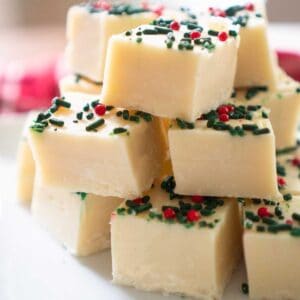 stack of white chocolate fudge with christmas sprinkles