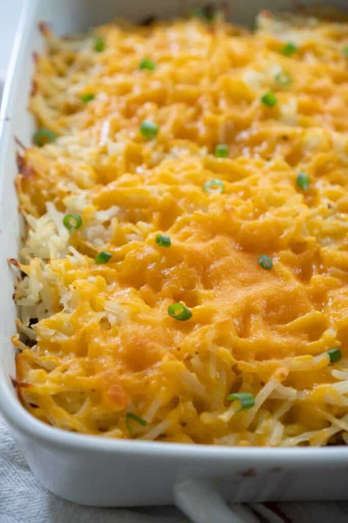 cheesy hash brown casserole in baking dish