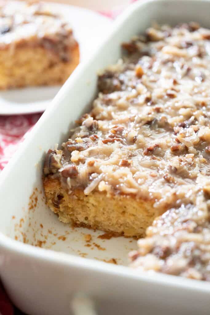 sliced Texas Tornado cake in white baking dish