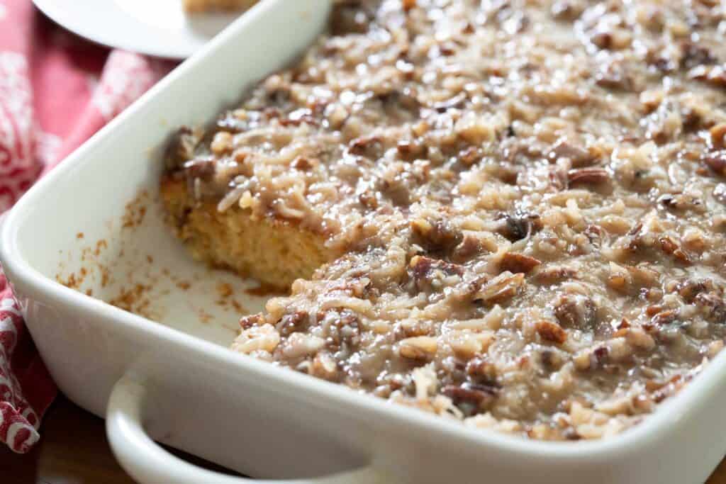 sliced Texas Tornado cake in white baking dish