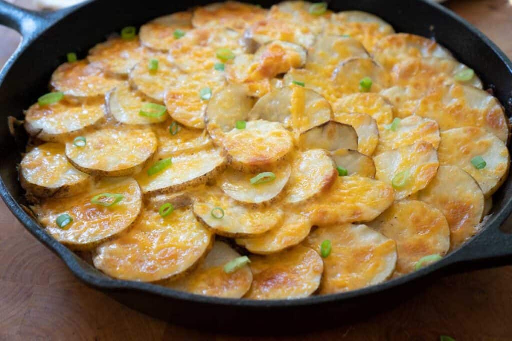 ground beef and potato in skillet 