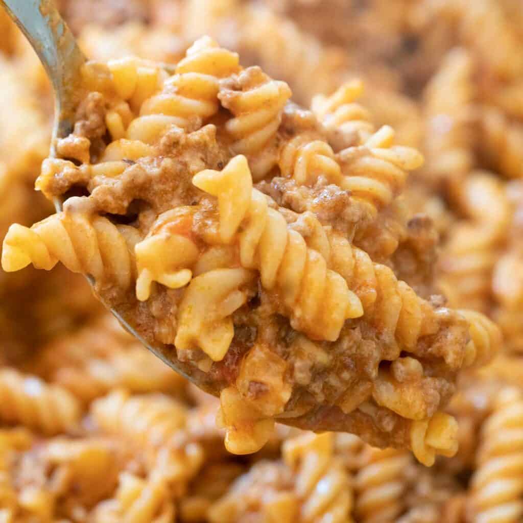 spoon with ground beef pasta