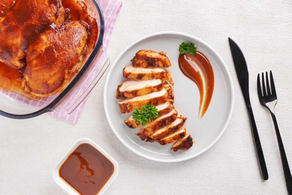 overhead view of sliced bbq chicken breast