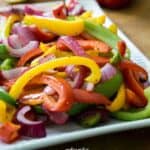 roasted bell peppers on white plate