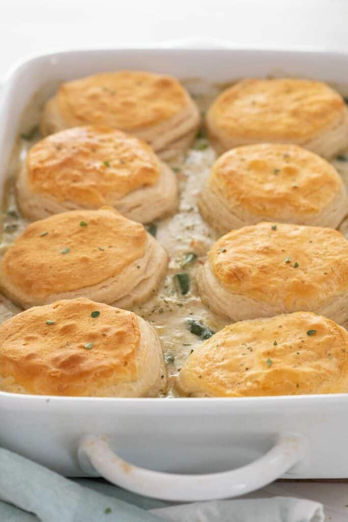 close up of chicken pot pie casserole with biscuits on top