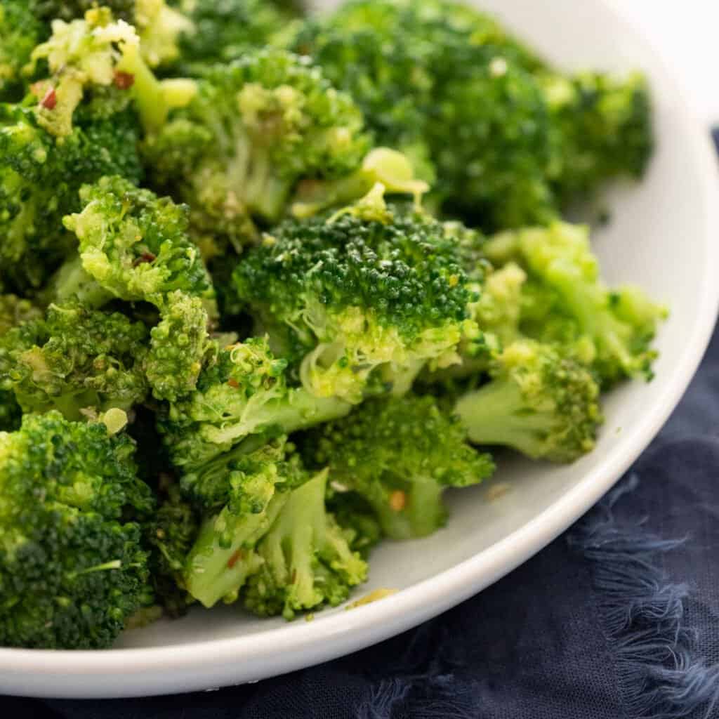 Italian style broccoli in white bowl