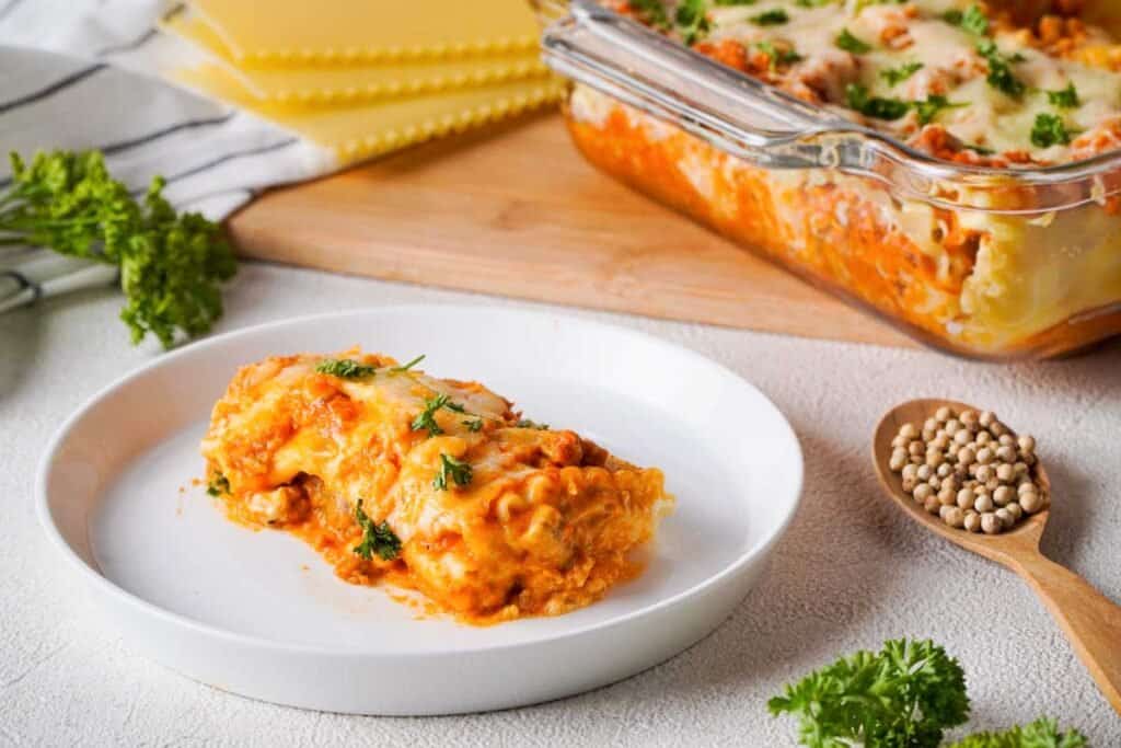 lasagna roll up on white plate