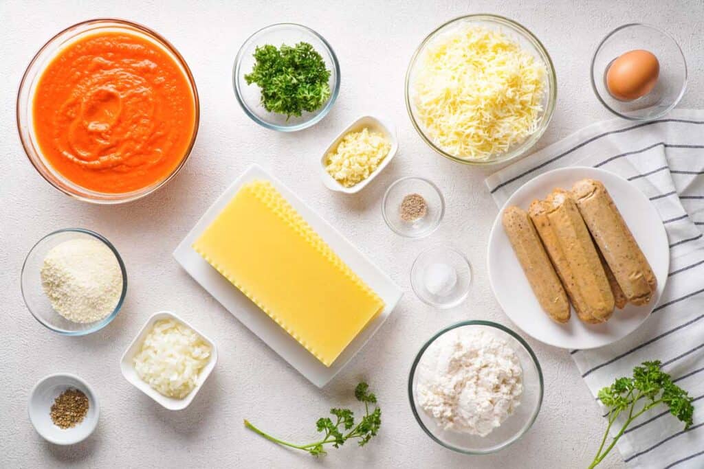 lasagna roll up ingredients on white countertop
