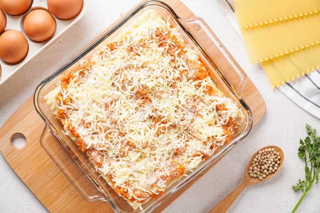 baking dish with lasagna roll ups before baking