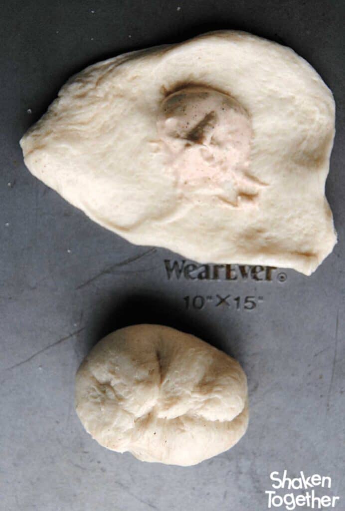 biscuit dough with dollop of cream cheese in the middle