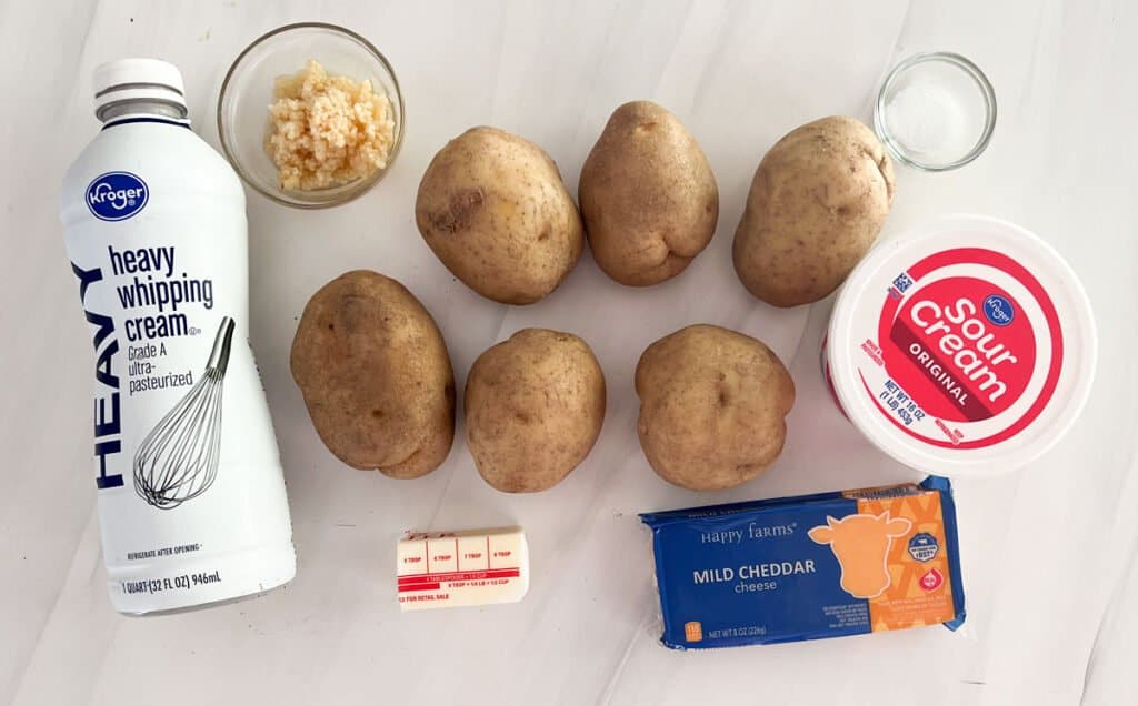 mashed potato ingredients on marble countertop