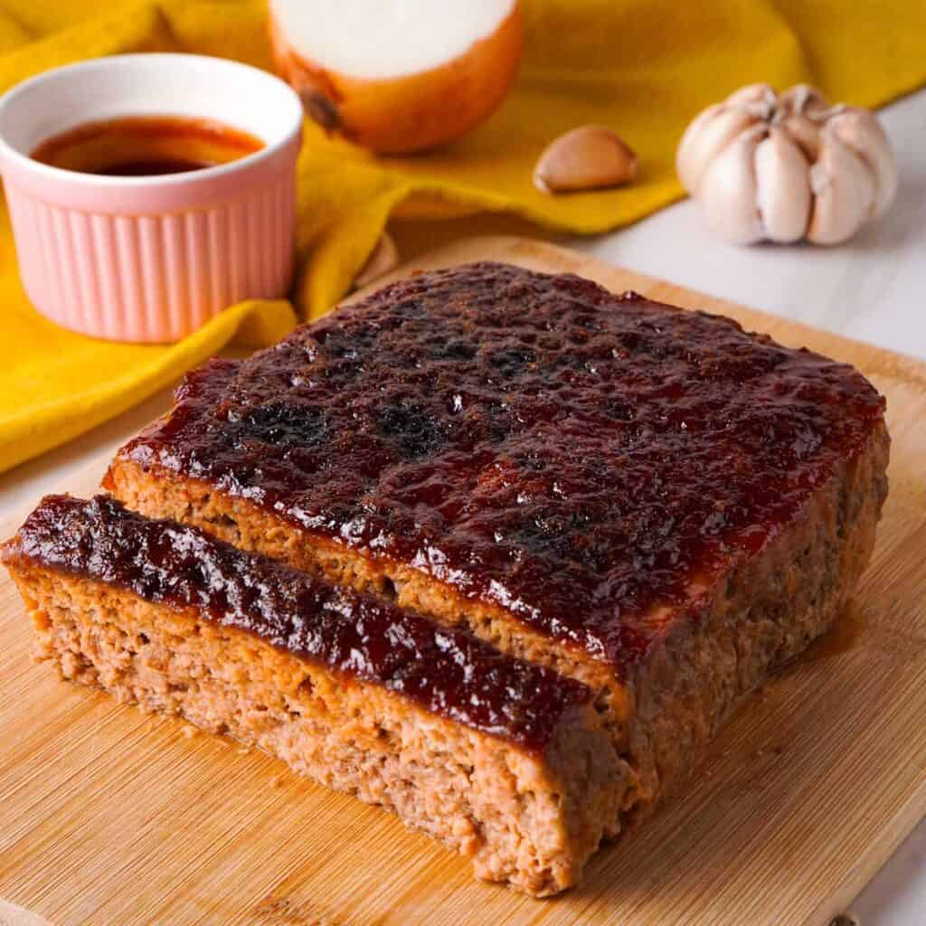 glazed meatloaf on cutting board