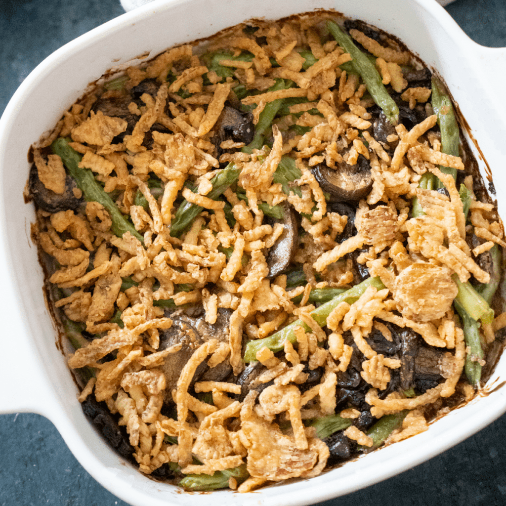 green bean casserole in a white baking dish