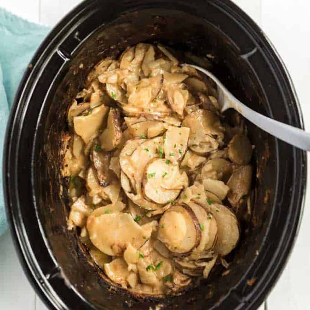 slow cooker with cheesy scalloped potatoes