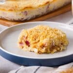 piece of chicken cordon bleu casserole on white plate