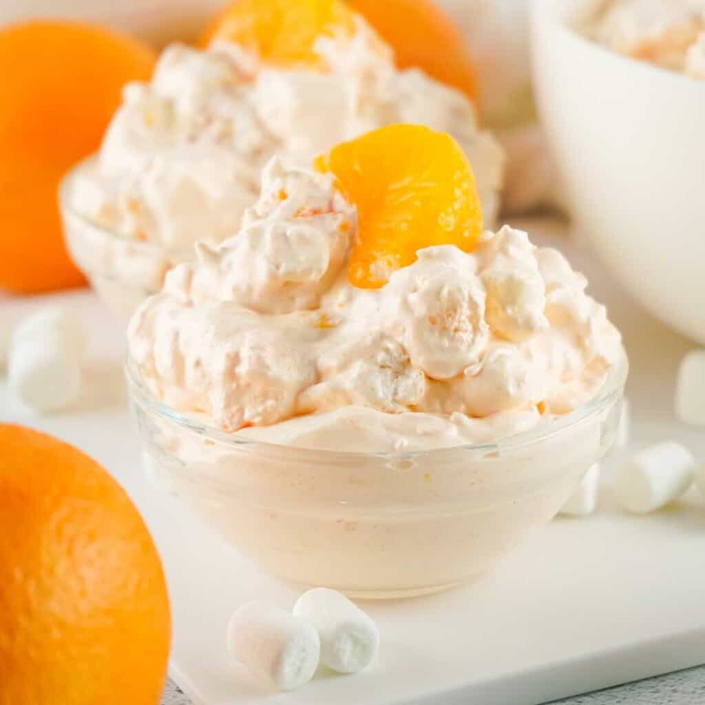 easy orange fluff salad in glass bowl