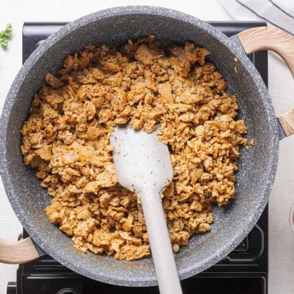 browned ground beef in skillet