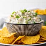 corn dip in a bowl with tortilla chips