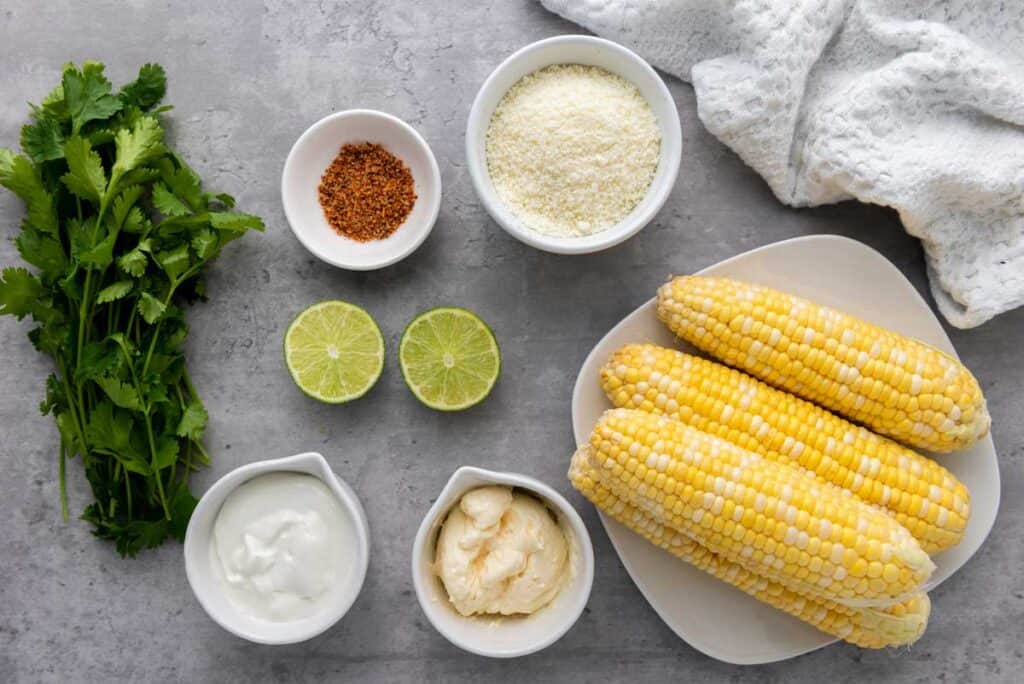 elotes ingredients on grey countertop