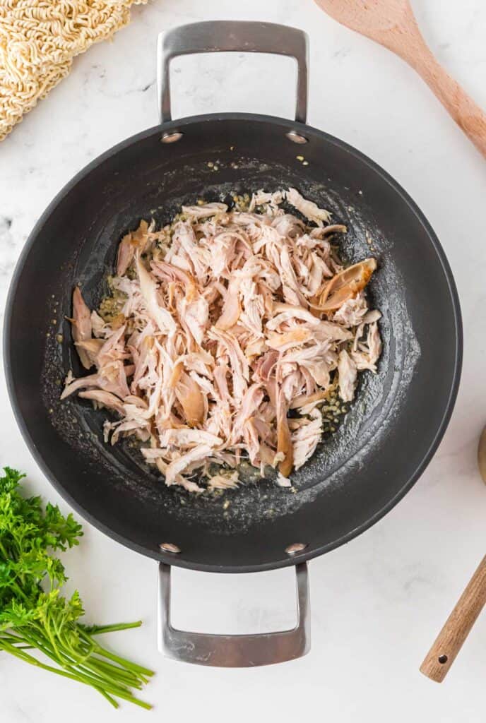 rotisserie chicken in skillet