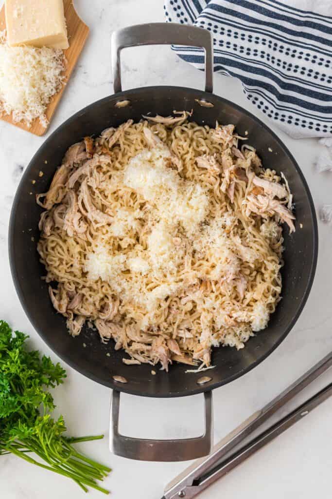 garlic parmesan chicken ramen in skillet