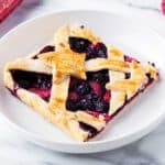piece of patriotic berry slab pie on white plate