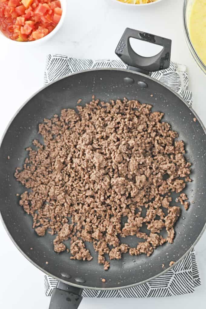 browned ground beef in skillet