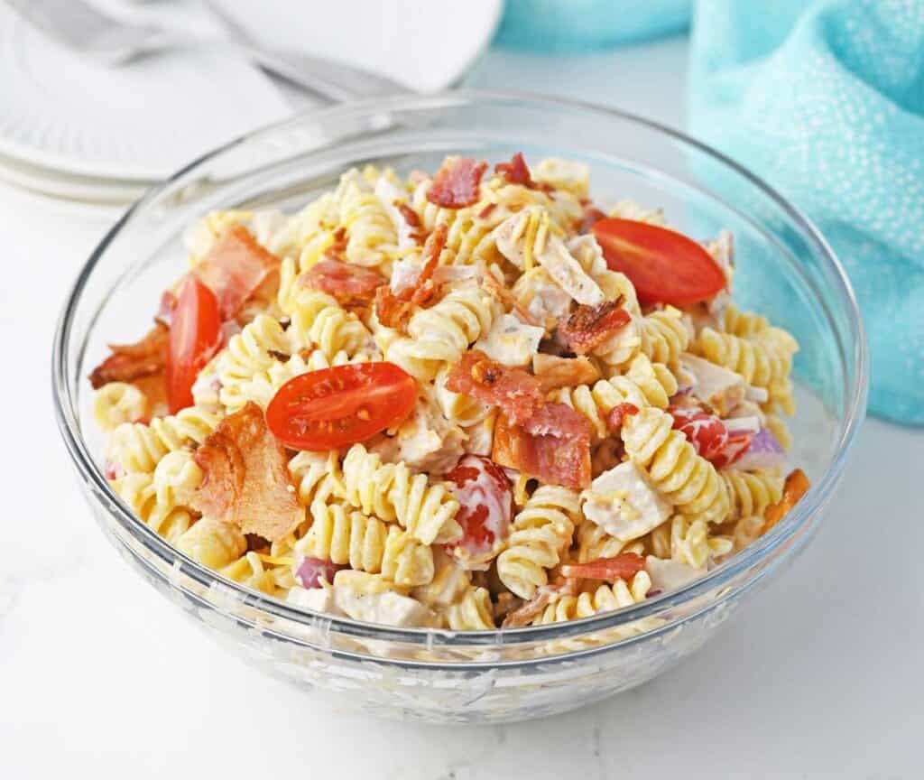 chicken bacon ranch pasta salad in glass bowl