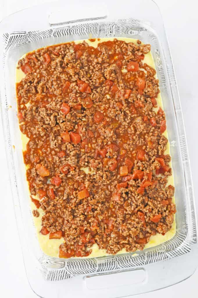 cornbread batter with ground beef mixture on top