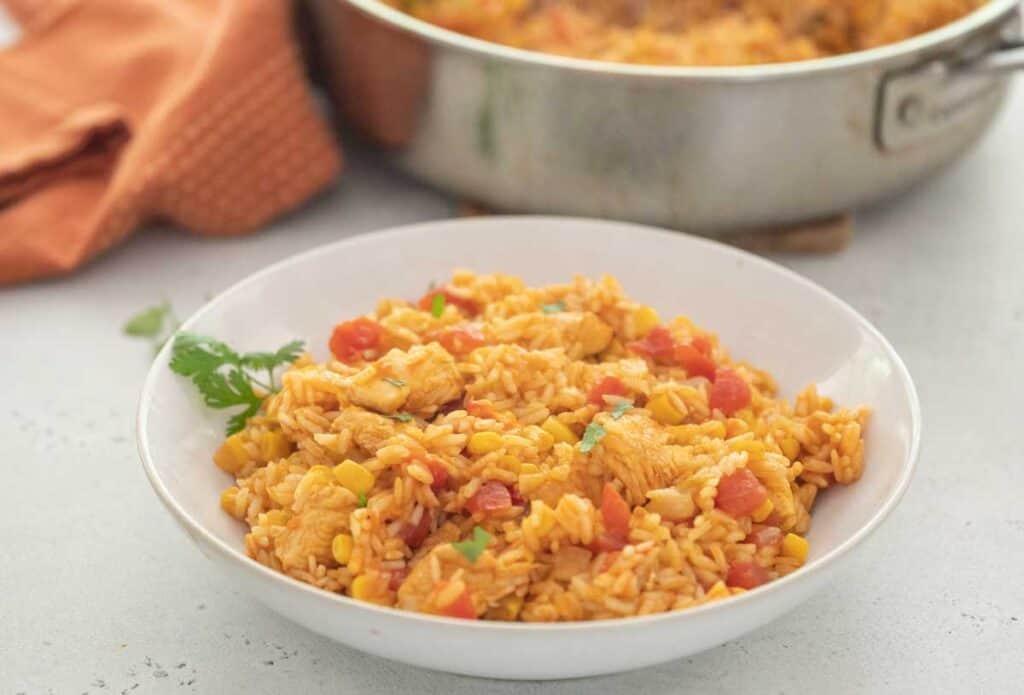 Mexican chicken and rice in white bowl
