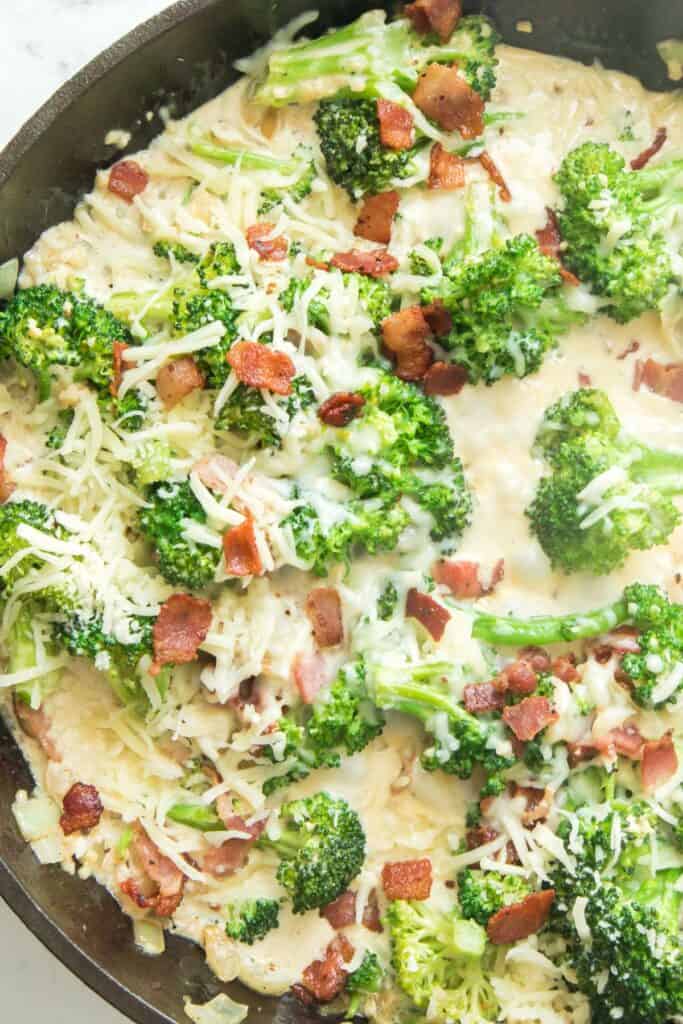 creamy bacon and broccoli in cast iron pan