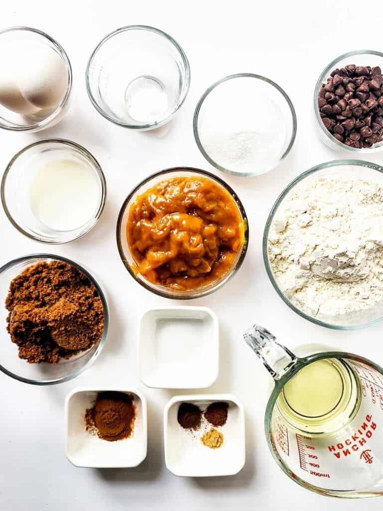 pumpkin spice bread ingredients on white countertop