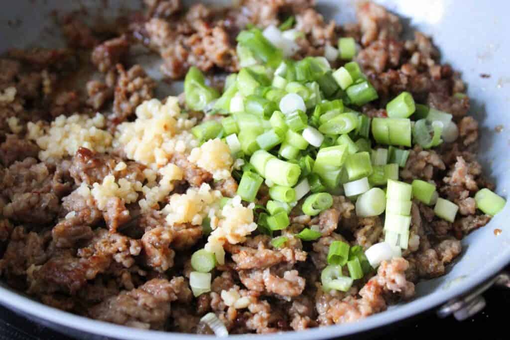 sausage with garlic and chopped green onions