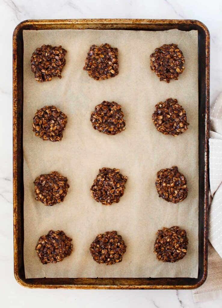 no-bake cookies on parchment paper-lined pan