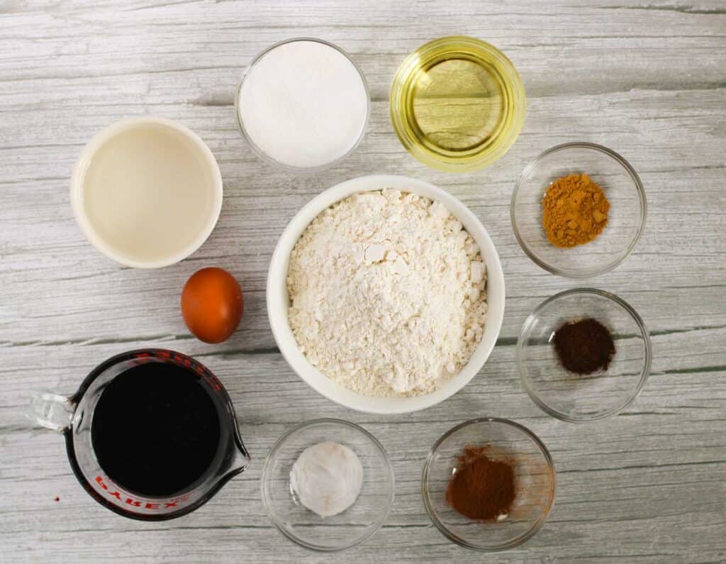 gingerbread cake ingredients on wooden countertop