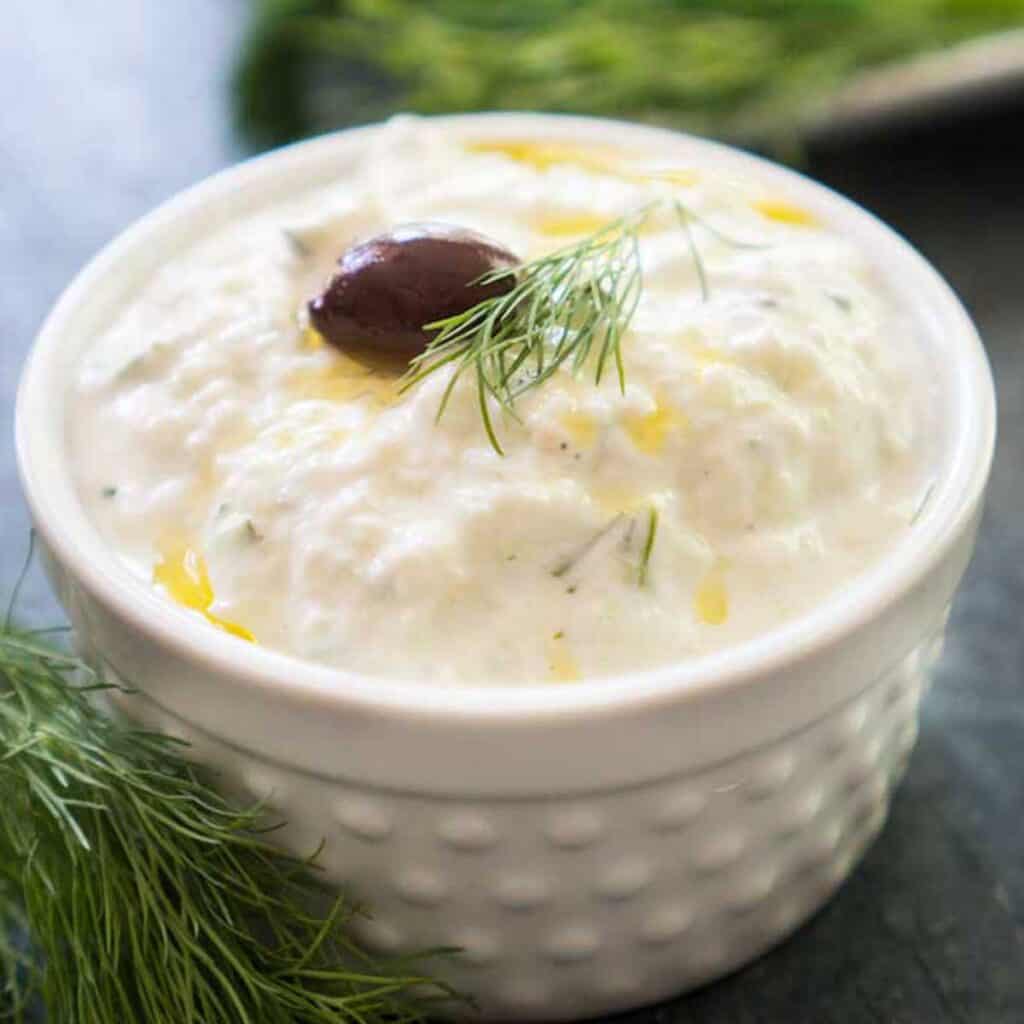 tzatziki sauce in white ramekin