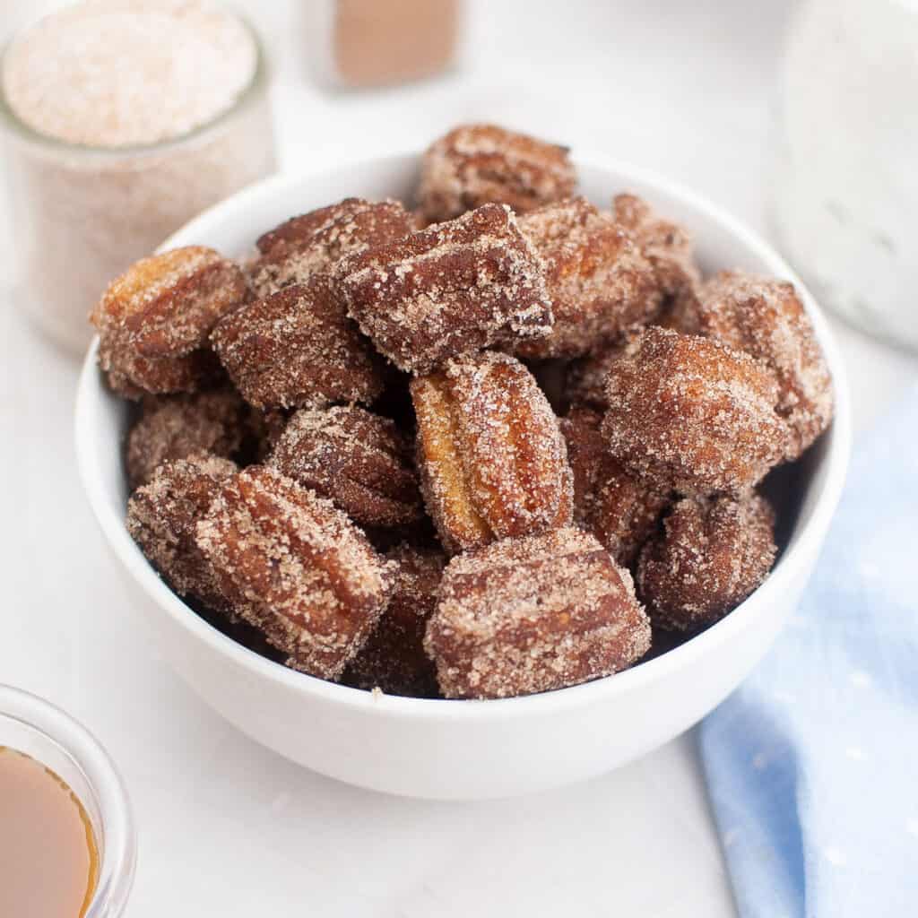 churro bites in white bowl
